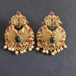Stunning Gold Plated Peacock Jhumka Earrings with Pearls and Colorful Stones